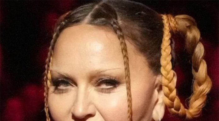 Madonna na grammyjih neprepoznavna; pravi, da je “svet ogrožen zaradi njene moči in vzdržljivosti”
