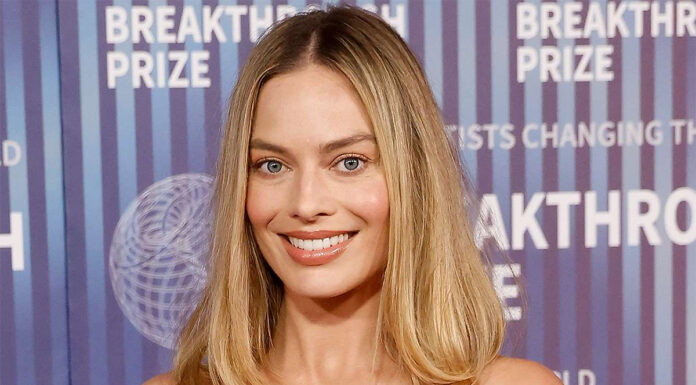 Noseča Margot Robbie pokazala trebušček