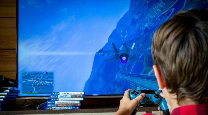 Nova epidemija odvisnosti: Koliko vaš otrok zapravi v videoigrah?